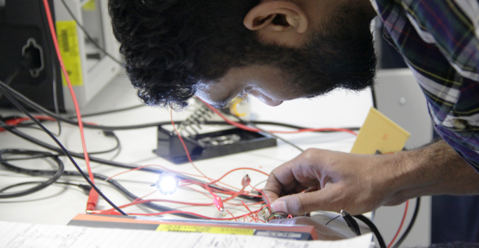Student working with circuits