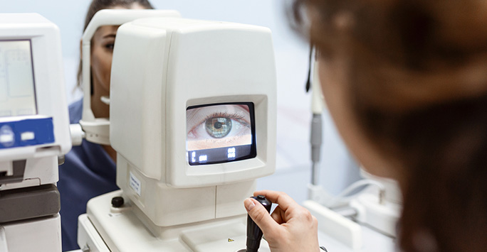 Female doctor examining a patient's eye