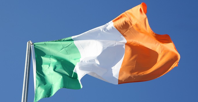 Irish tricolour flag on flagpole