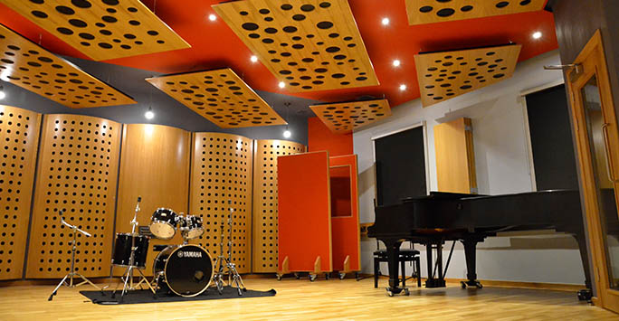 Studio with drum kit and piano at the Department of Music.