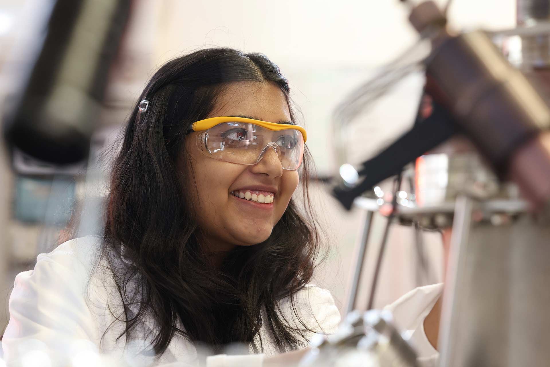 A student conducts research in a laboratory.