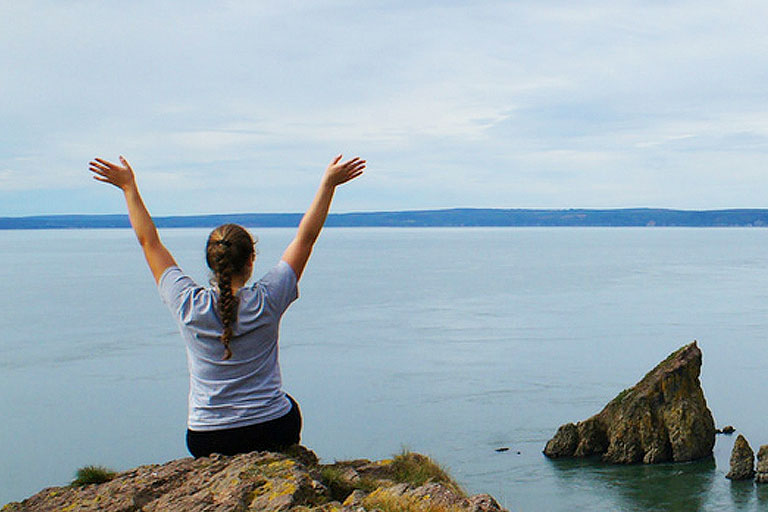 A student on a year abroad in the sun looking out to sea