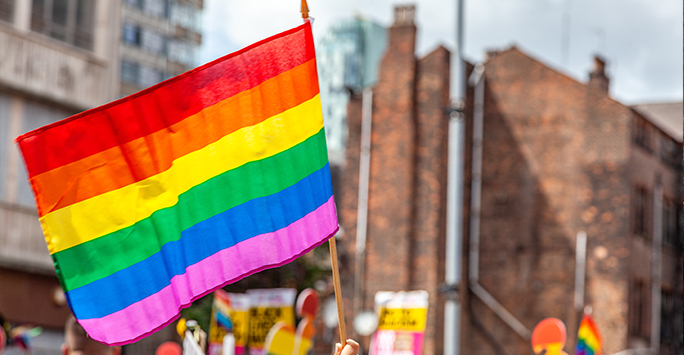 pride flag in busy area