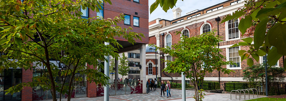 Students walking past University of Liverpool campus accommodation