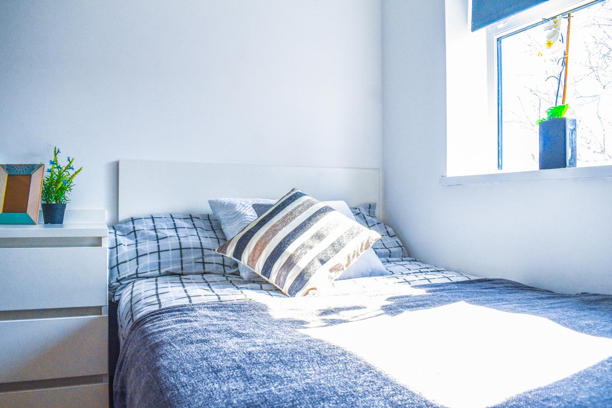 A bed in a Premium Non-Ensuite bedroom at Agnes Jones House.