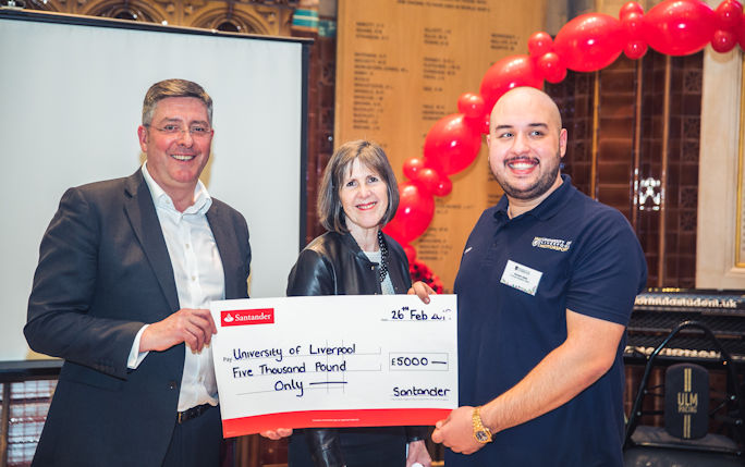 Matt Hutnell, alongside the Vice-Chancellor, presenting cheque to Formula Student Team.