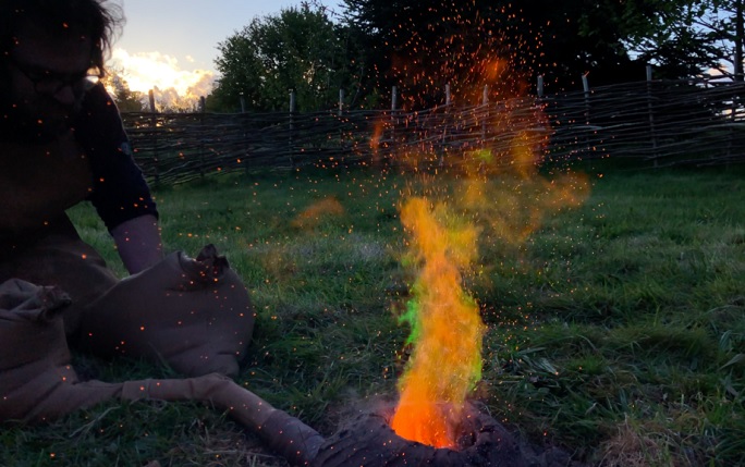 Process of turning rock into metal and the colourful flames generated in this process