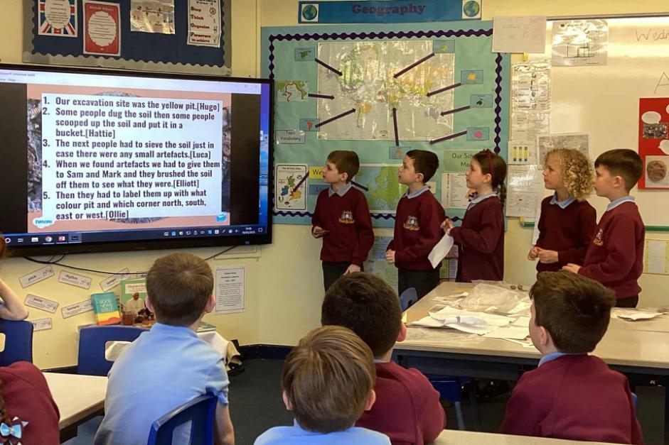 A group of children in a classroom