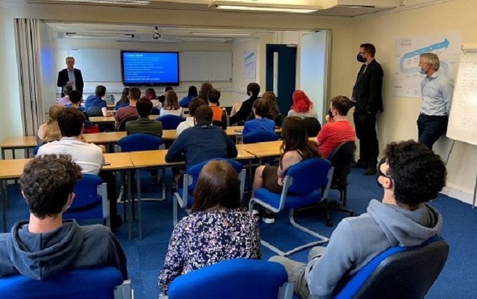 Steve Garnett talking to students during his Maths School visit