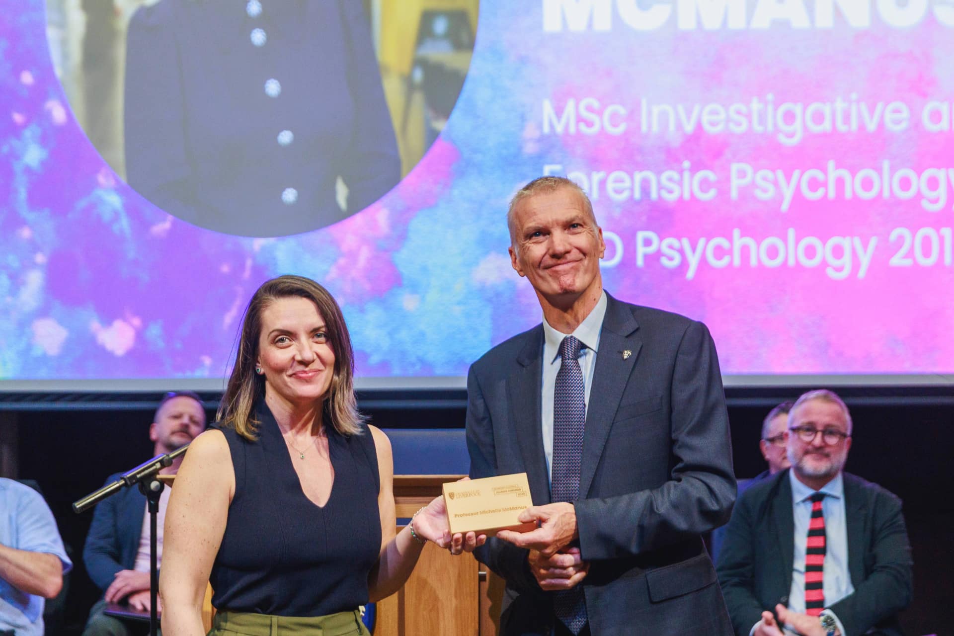 Image of person accepting an award