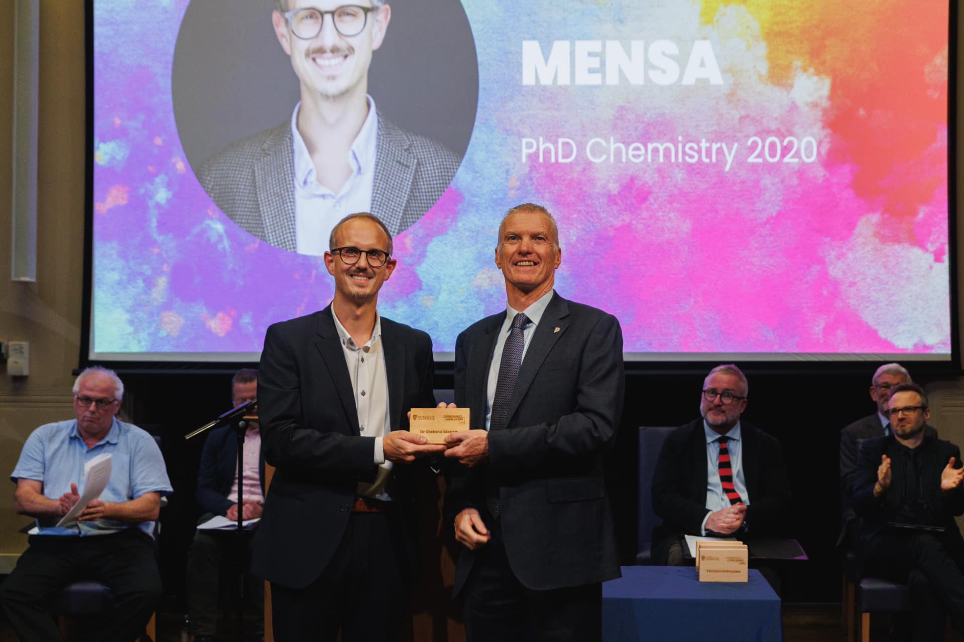 Image of person accepting an award