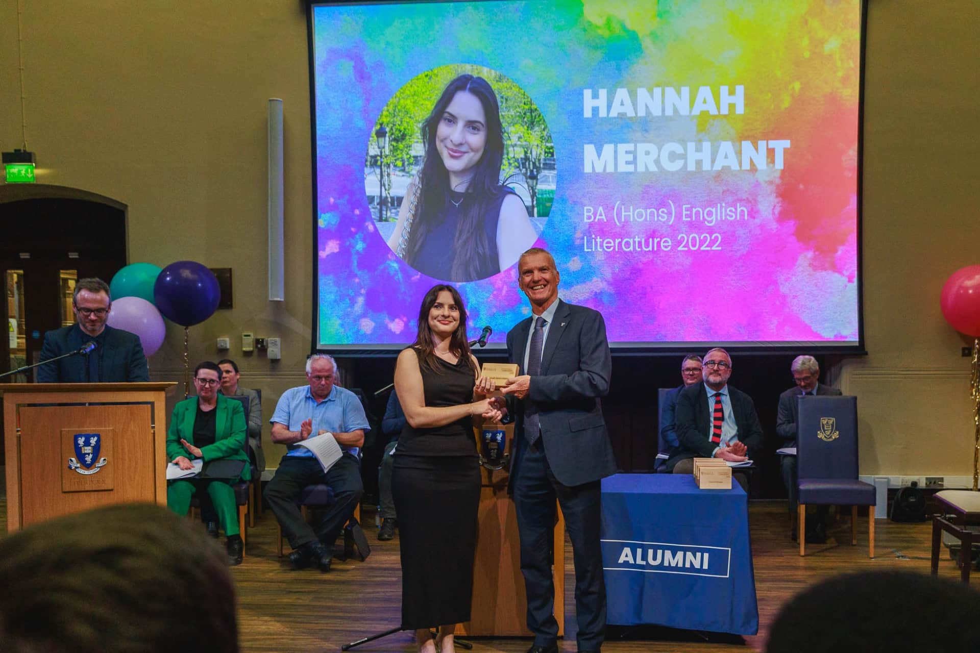 Image of person accepting an award