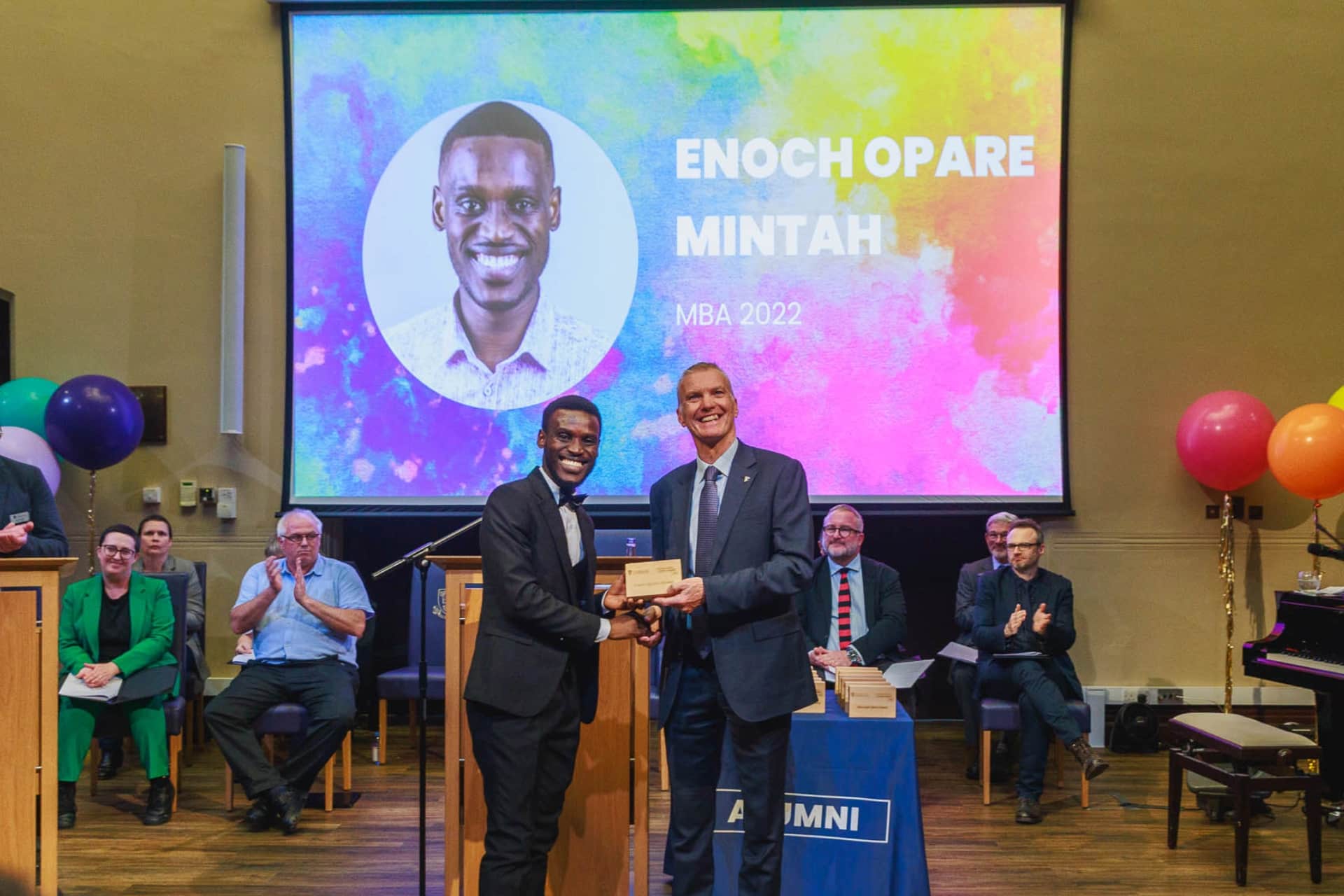 Image of person accepting an award