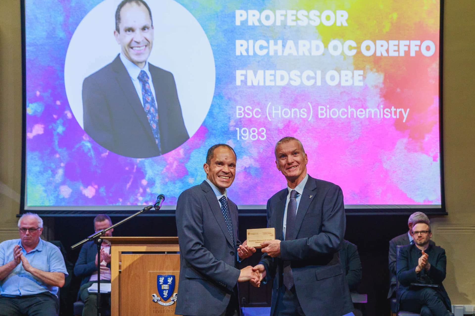 Image of person accepting an award