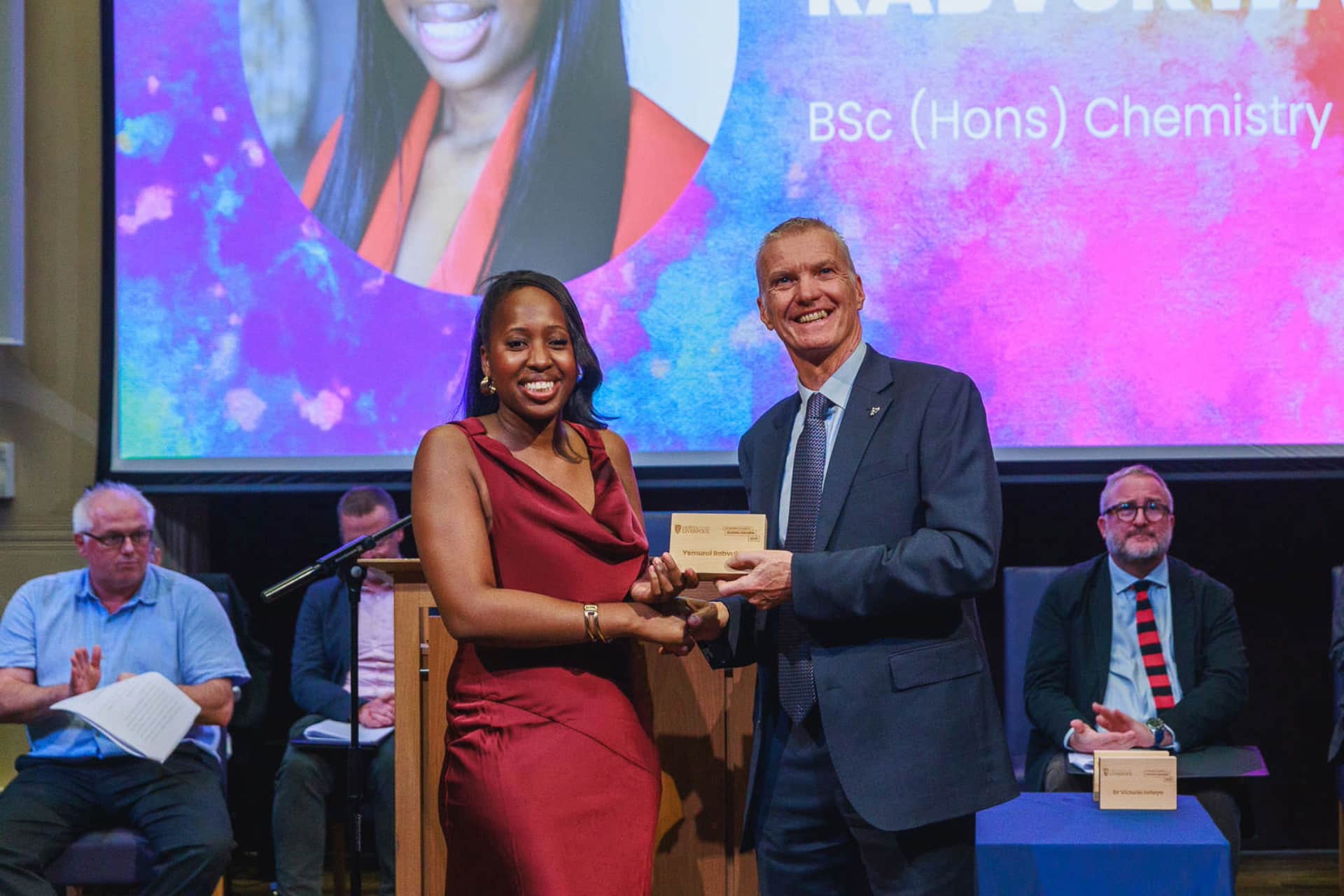 Image of person accepting an award