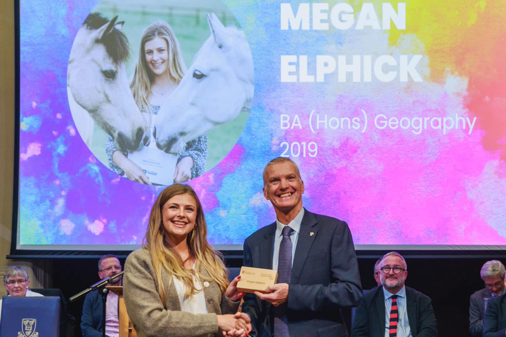 Image of person accepting an award