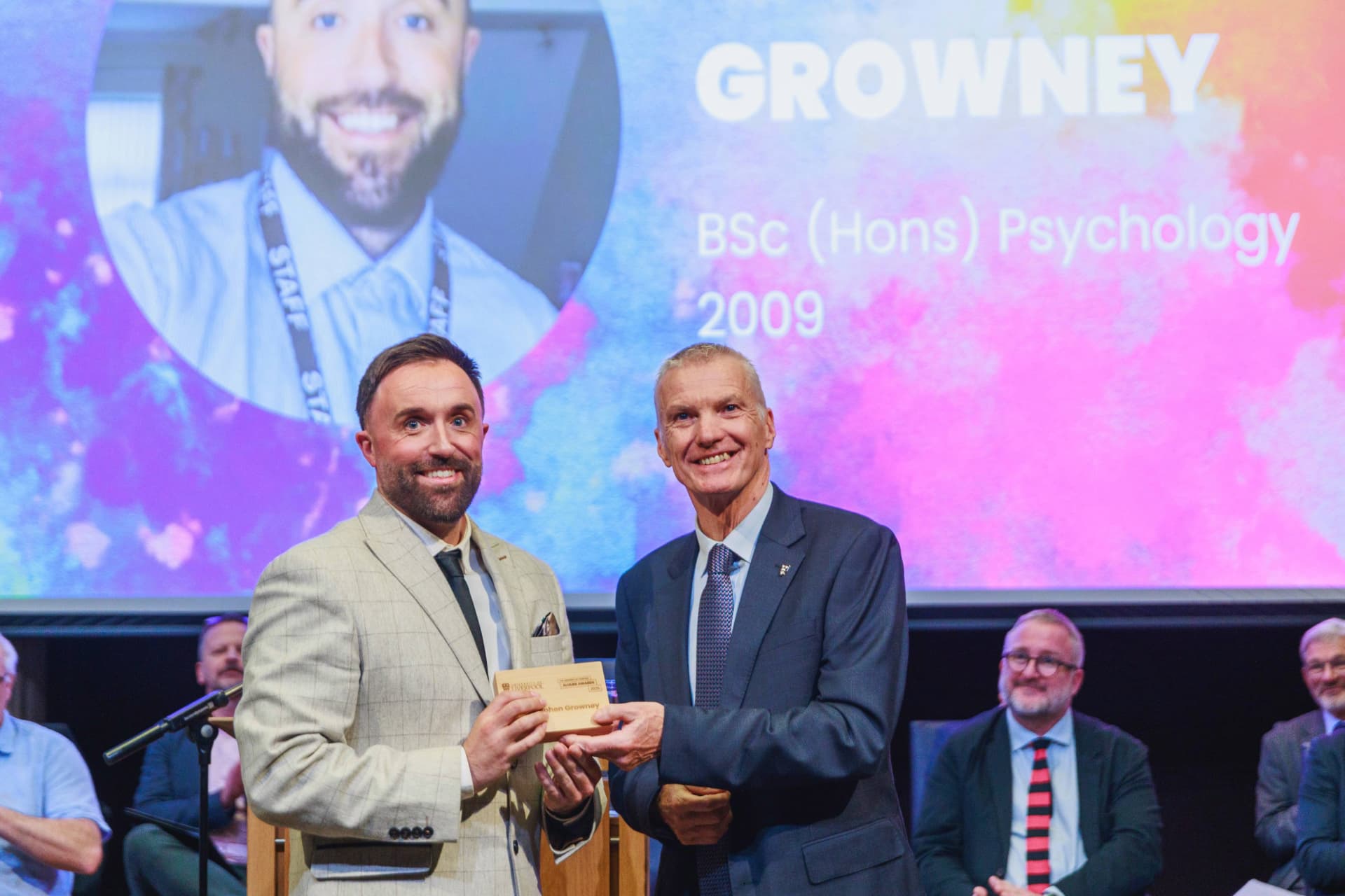 Image of person accepting an award