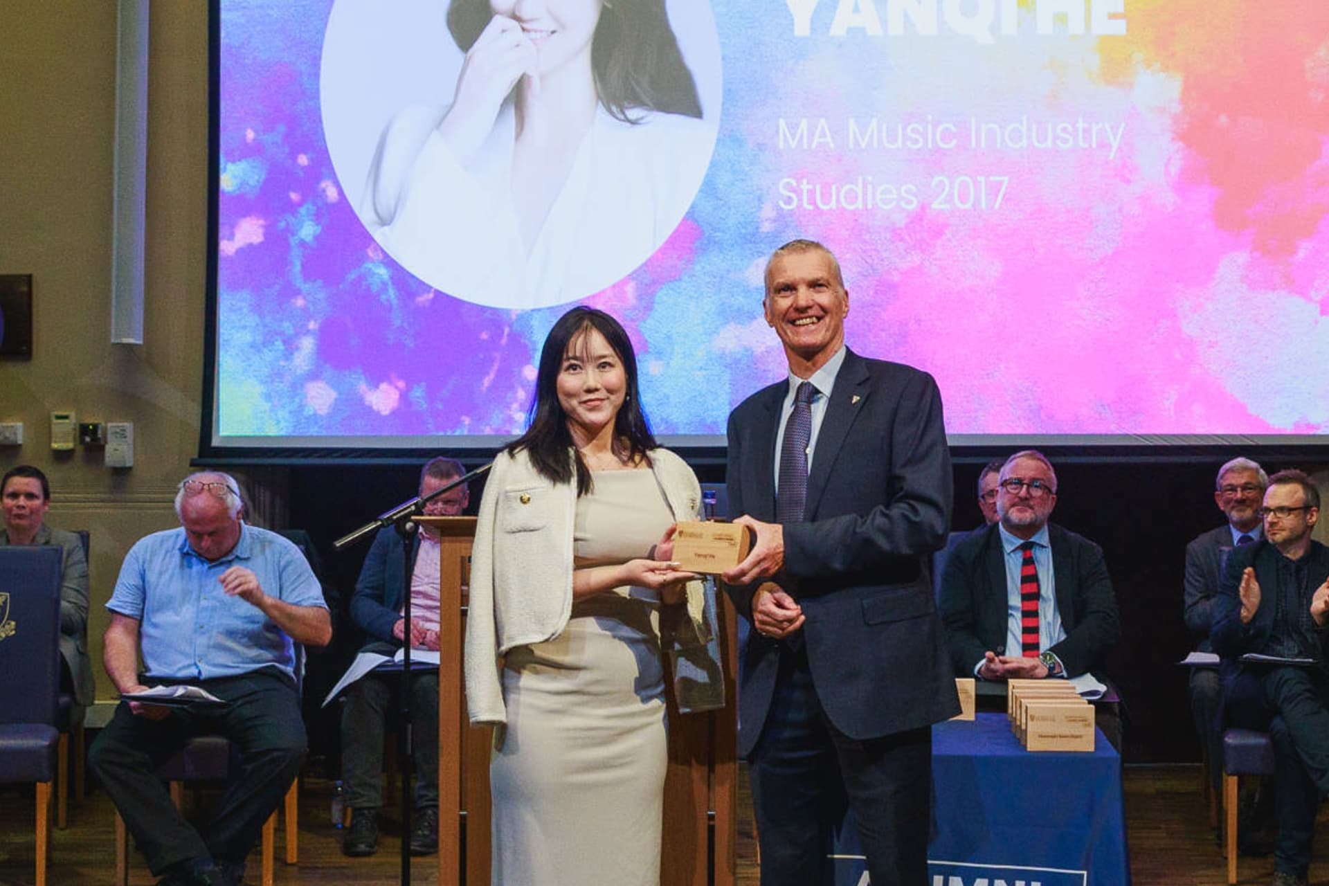 Image of person accepting an award