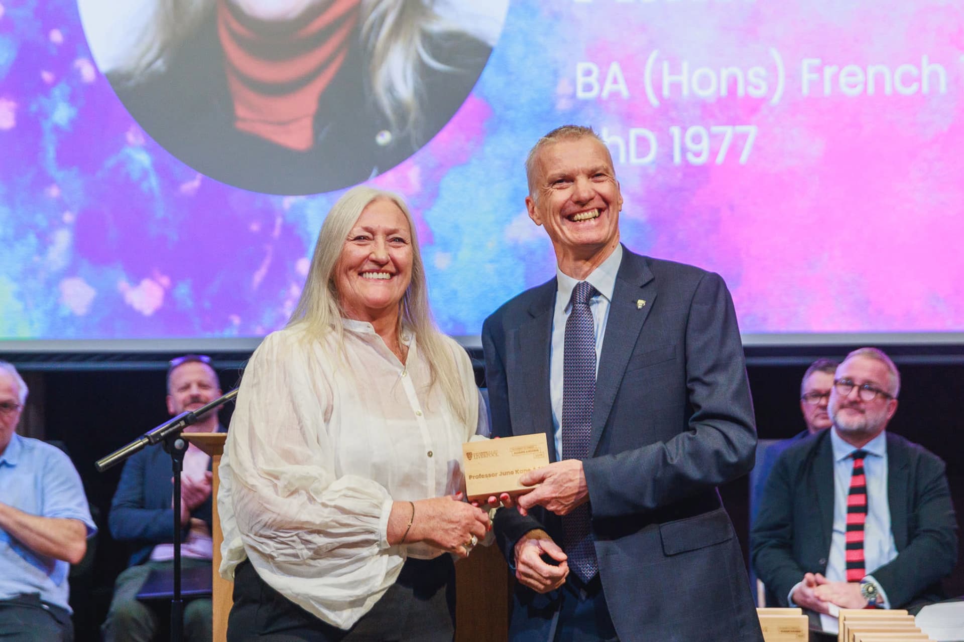 Image of person accepting an award