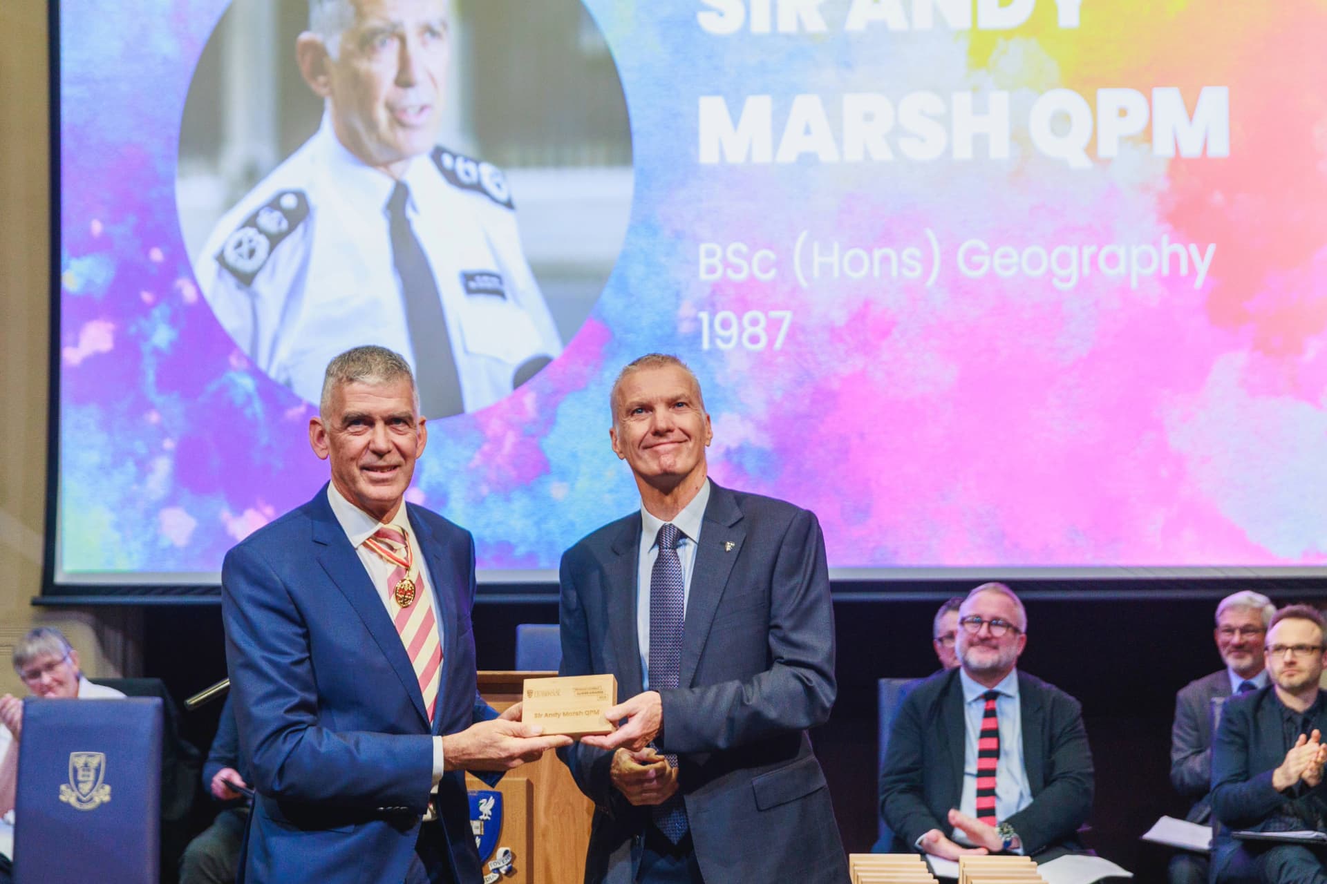 Image of person accepting an award