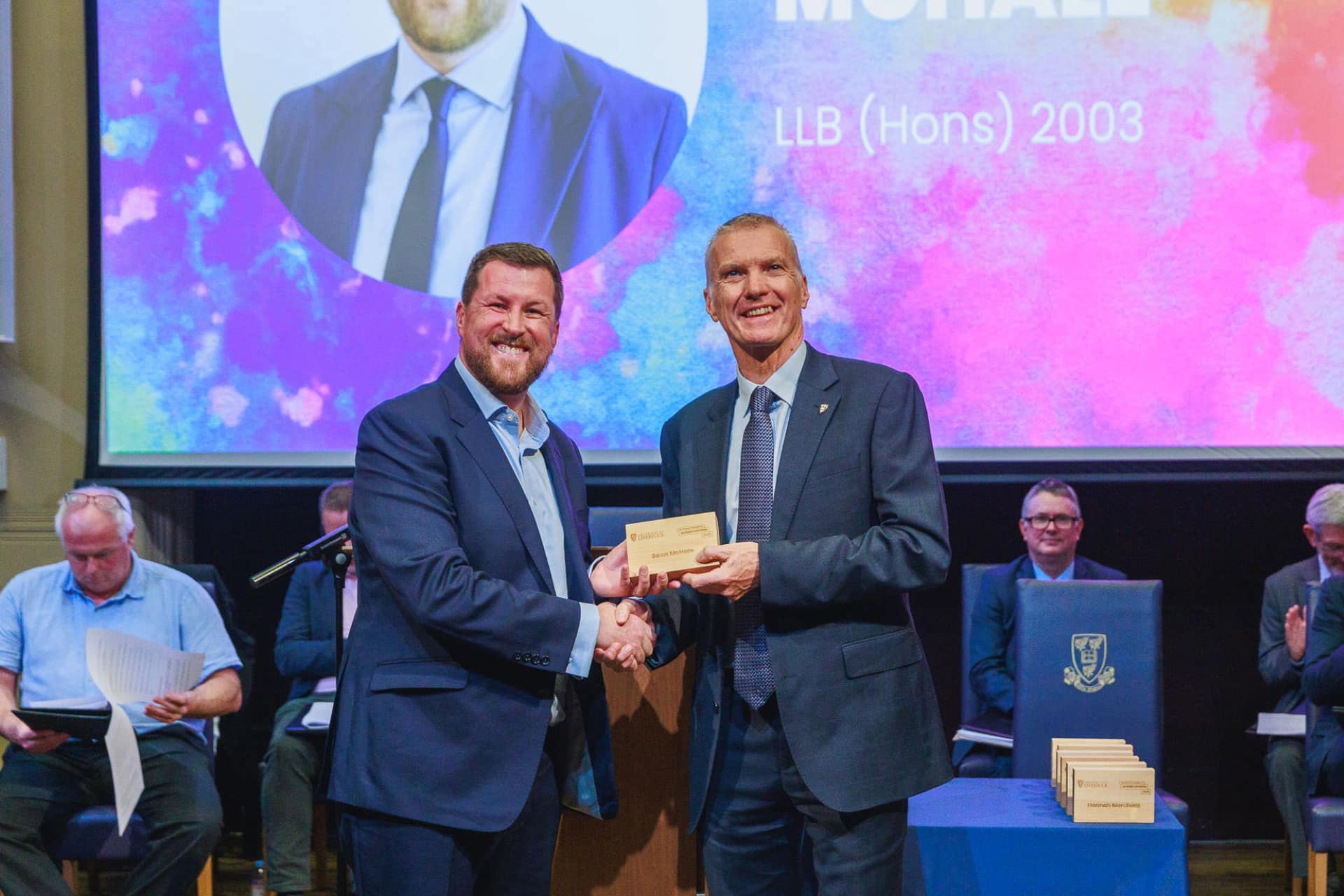 Image of person accepting an award