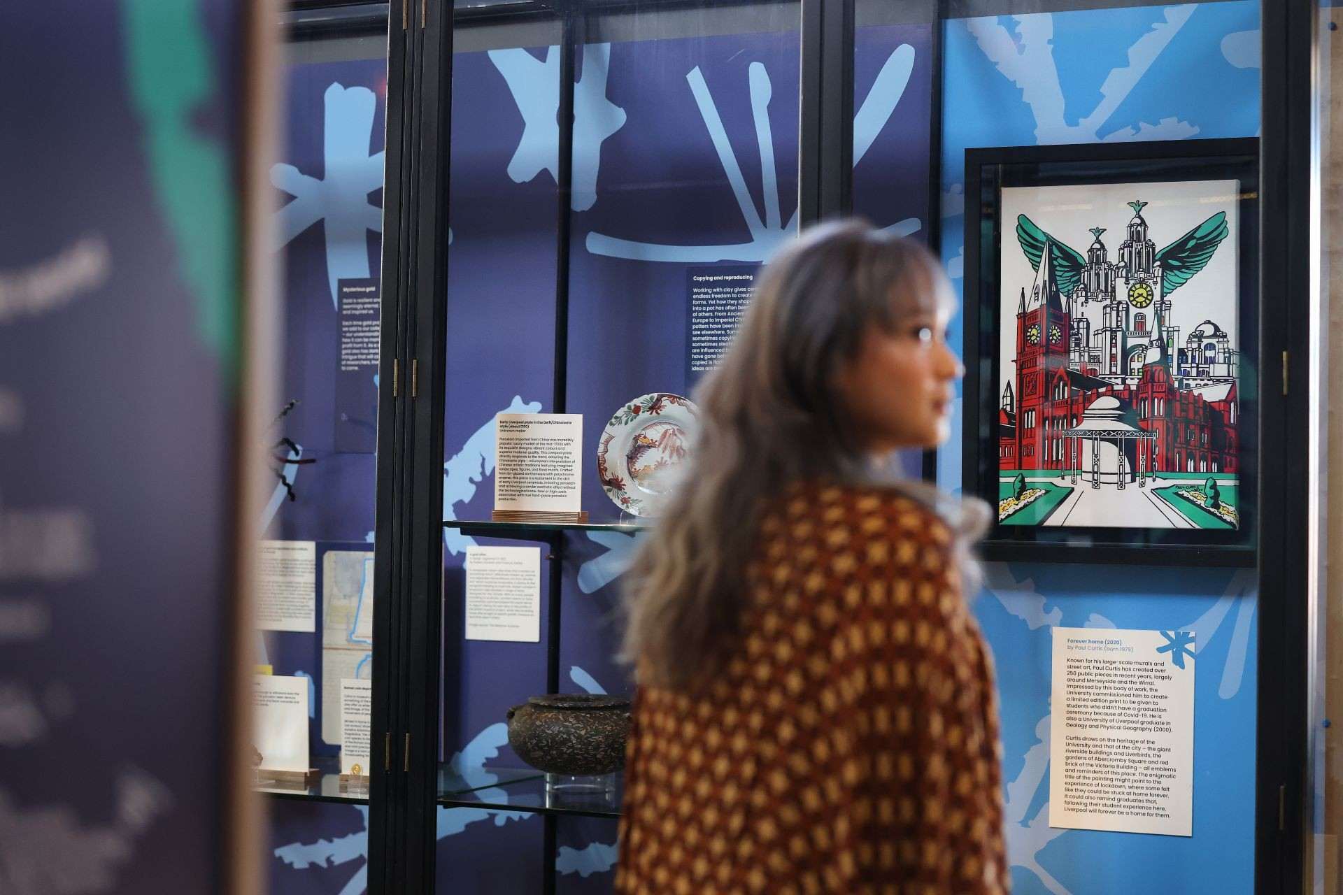 person looking at an exhibition