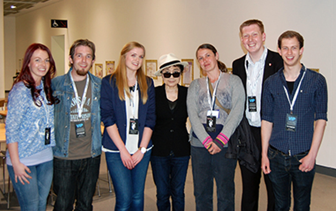 Yoko Ono pictured with John Lennon scholars