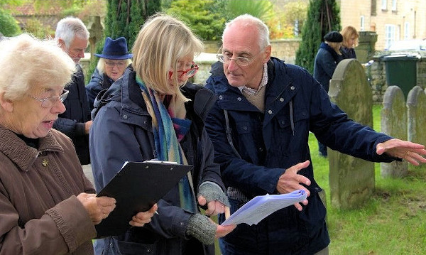 Harold Mytum helping a community group with their graveyard recording