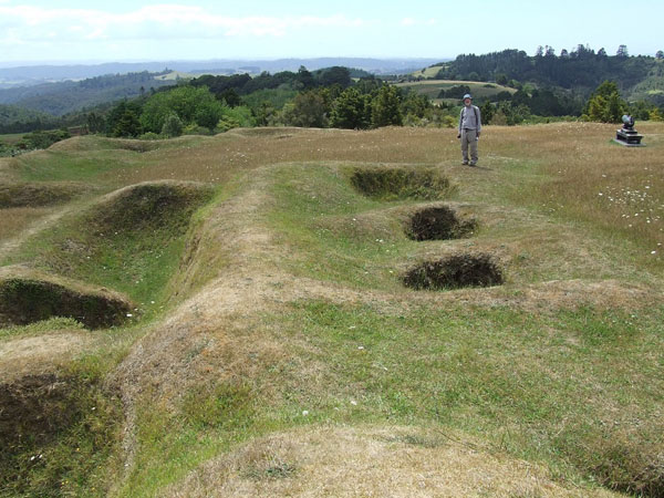 Interior of Ruapekapeka (Gunfighter) pā with earthwork defences which would have been topped with tall timber palisades, and foxholes for Maori warriors to shelter from British bombardment.