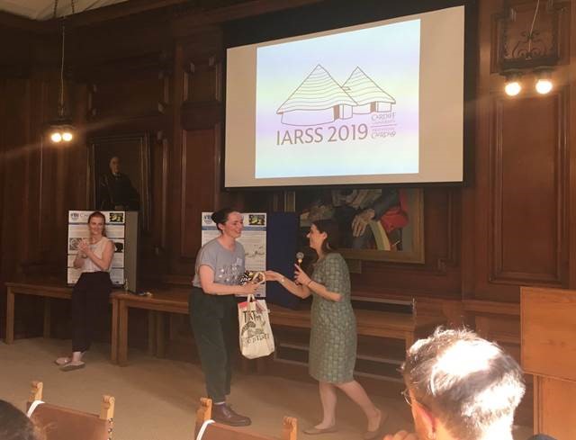 Emily Prtak winning best poster at IARSS 2019