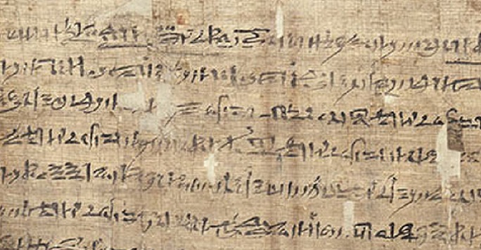 ancient egyptian script in black on a beige scroll