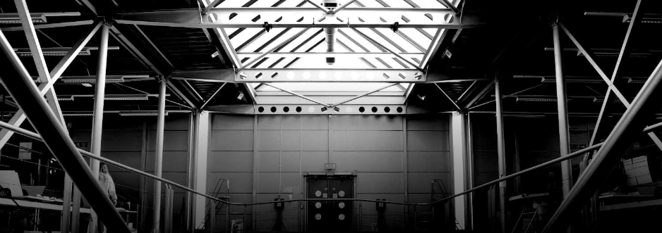 Interior of the Stirling gallery, steel frames with a pitched glass roof.