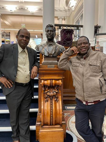 AHUWA members with statue at Port Sunlight