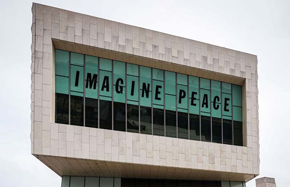 Museum of Liverpool with Imagine Peace banner in windows