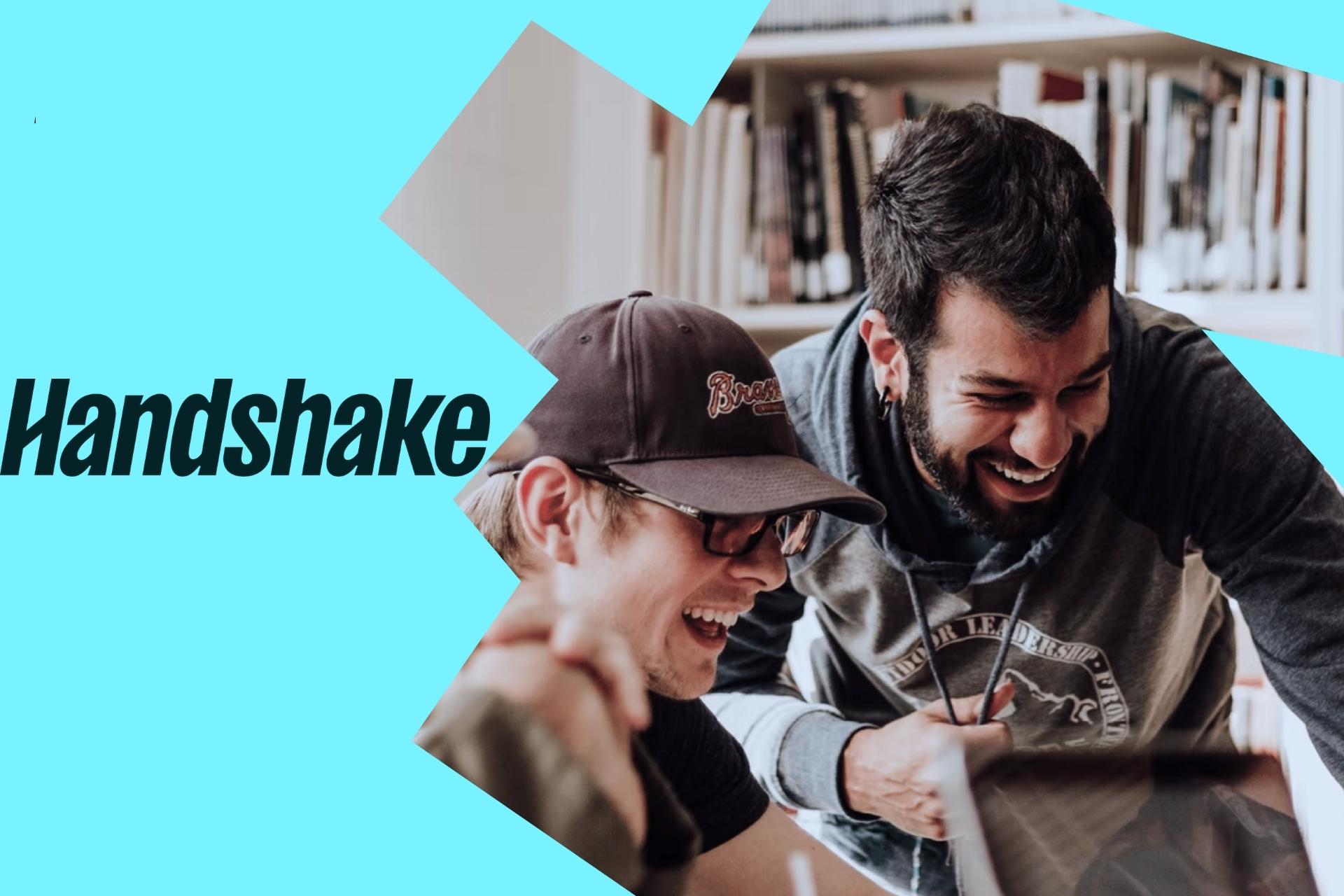 2 Students looking at a PC