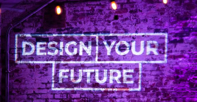 Design Your Future Logo on brick wall