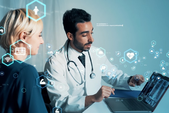 Scientists view results on a laptop