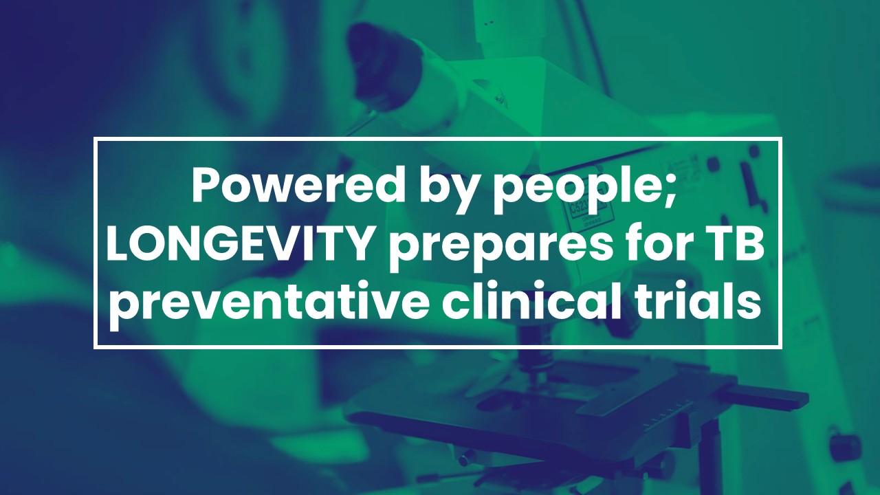 A scientist from Chelsea and Westminster is looking through a microscope. The title of the blog is written over the top