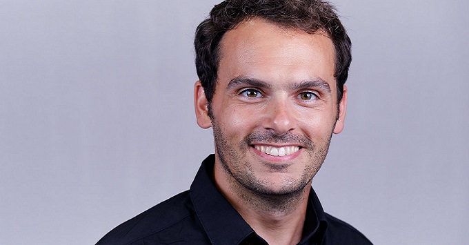 Dr Marco Giardiello is smiling into the camera