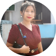 Monica Subba is smiling into the camera