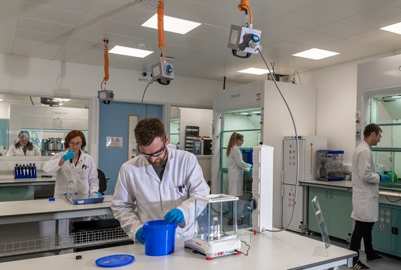 A scientist is working in their lab