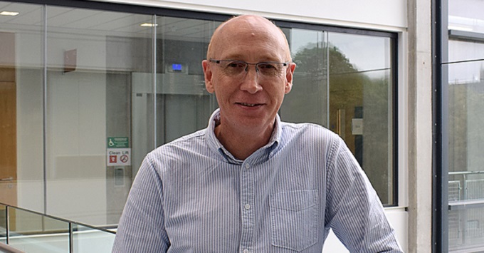 Professor Steve Rannard is smiling into the camera