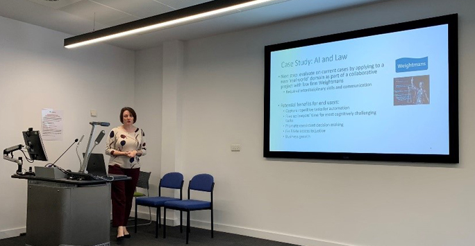 Professor Katie Atkinson presenting a case study on AI and Law