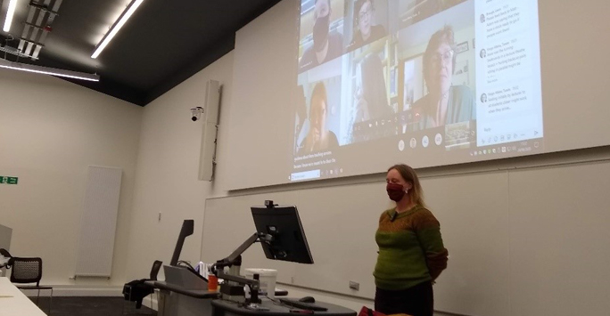 Lecturer Teaching in Lecture Room