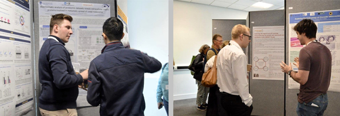 Researchers explains their findings stood by their physical poster presentations