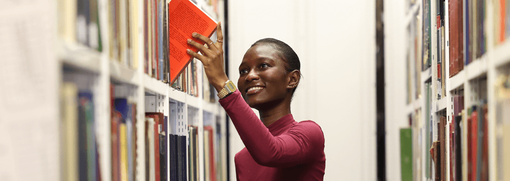 Student Looking at Books