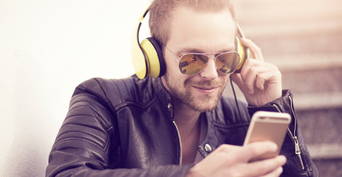 Man listening to music on his phone