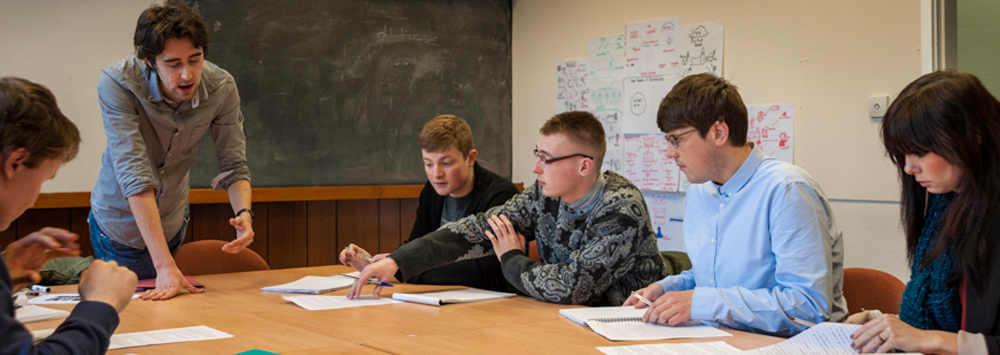 Lecturer and Students in Discussion