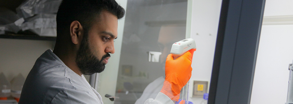 Male scientist working in lab