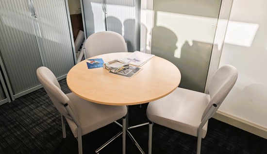 Modern Regus office space in London, featuring sleek furniture and a collaborative work environment.
